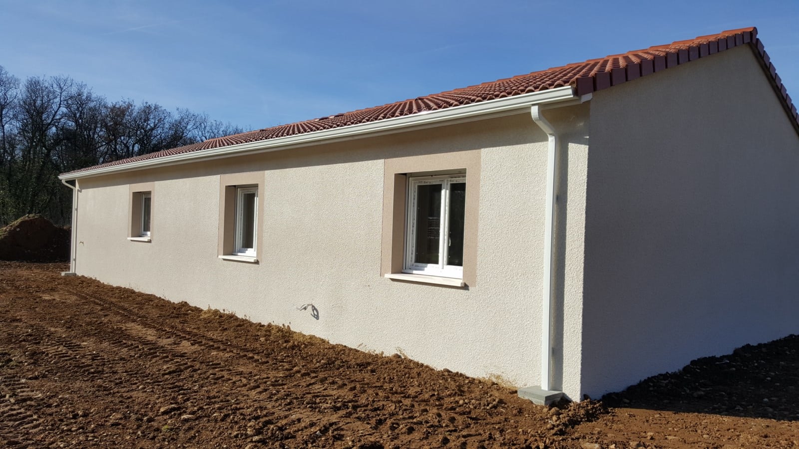maison-tradibati-facade-arriere Construction maison plain pied à La Baume d’Hostun